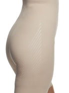 a closeup detail woman wearing a nude high waisted tummy control shapewear short