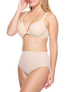 a woman wearing nude tummy control underwear