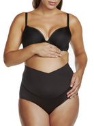 a woman wearing a black maternity support brief