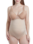 a woman wearing a nude maternity shapewear support brief