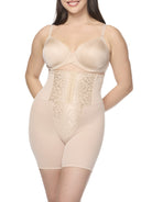 a woman wearing a nude high waisted tummy control waist cincher shaping short shapewear