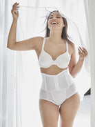 a women standing in front of white curtains wearing white high waisted tummy control waist cincher waist trainer underwear shapewear