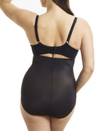 a woman wearing black high waisted tummy control underwear