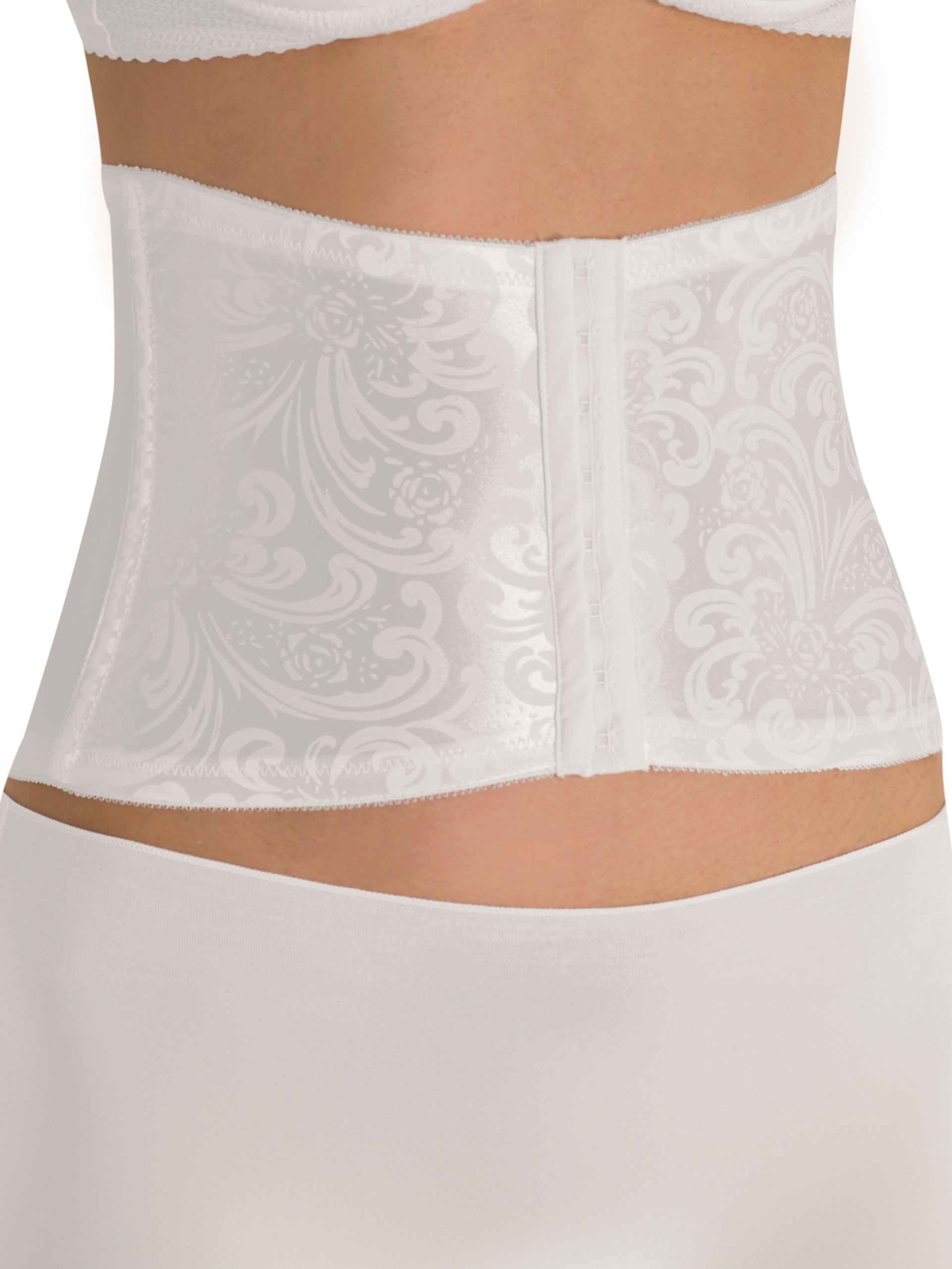 a woman wearing a white waist cincher