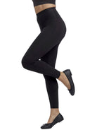 a woman wearing black tummy control leggings shapewear