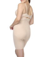 a woman wearing nude high waisted tummy control shapewear shorts