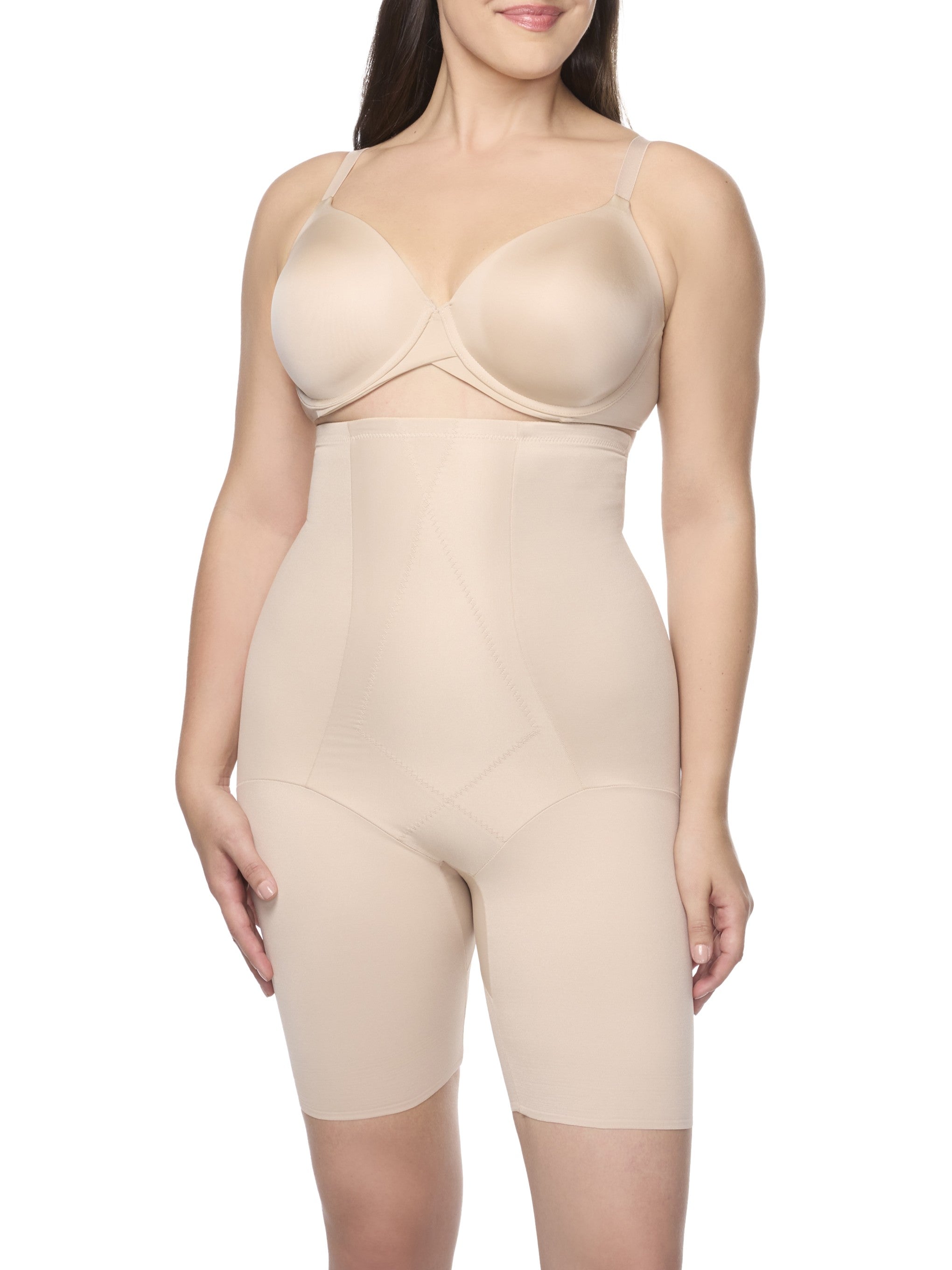 a woman wearing nude high waisted tummy control shapewear shorts