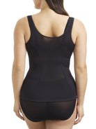 a woman wearing a black open bust shaping camisole shapewear