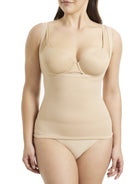 a woman wearing a nude open bust shaping camisole shapewear