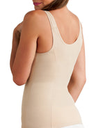 a woman wearing a nude open bust shaping camisole shapewear