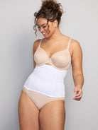 a woman wearing a white waist cincher waist trainer girdle shapewear all-groups