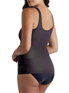 a woman wearing a black shaping camisole tank top shapewear