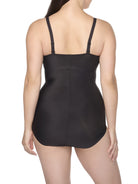 a woman wearing a black tummy control body shaper shapewear