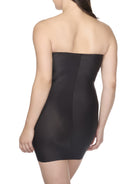 a woman wearing a black tummy control strapless slip body shaper shapewear