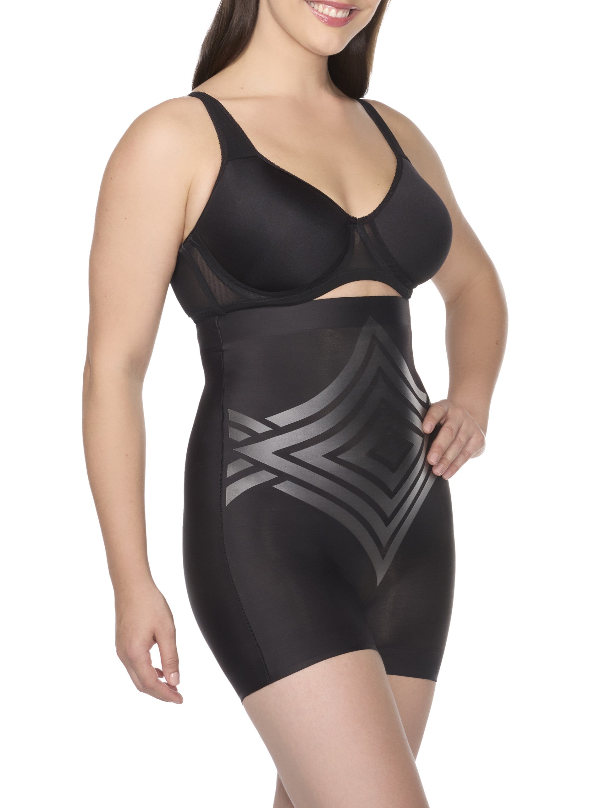 a woman wearing a black high waisted tummy control shapewear short