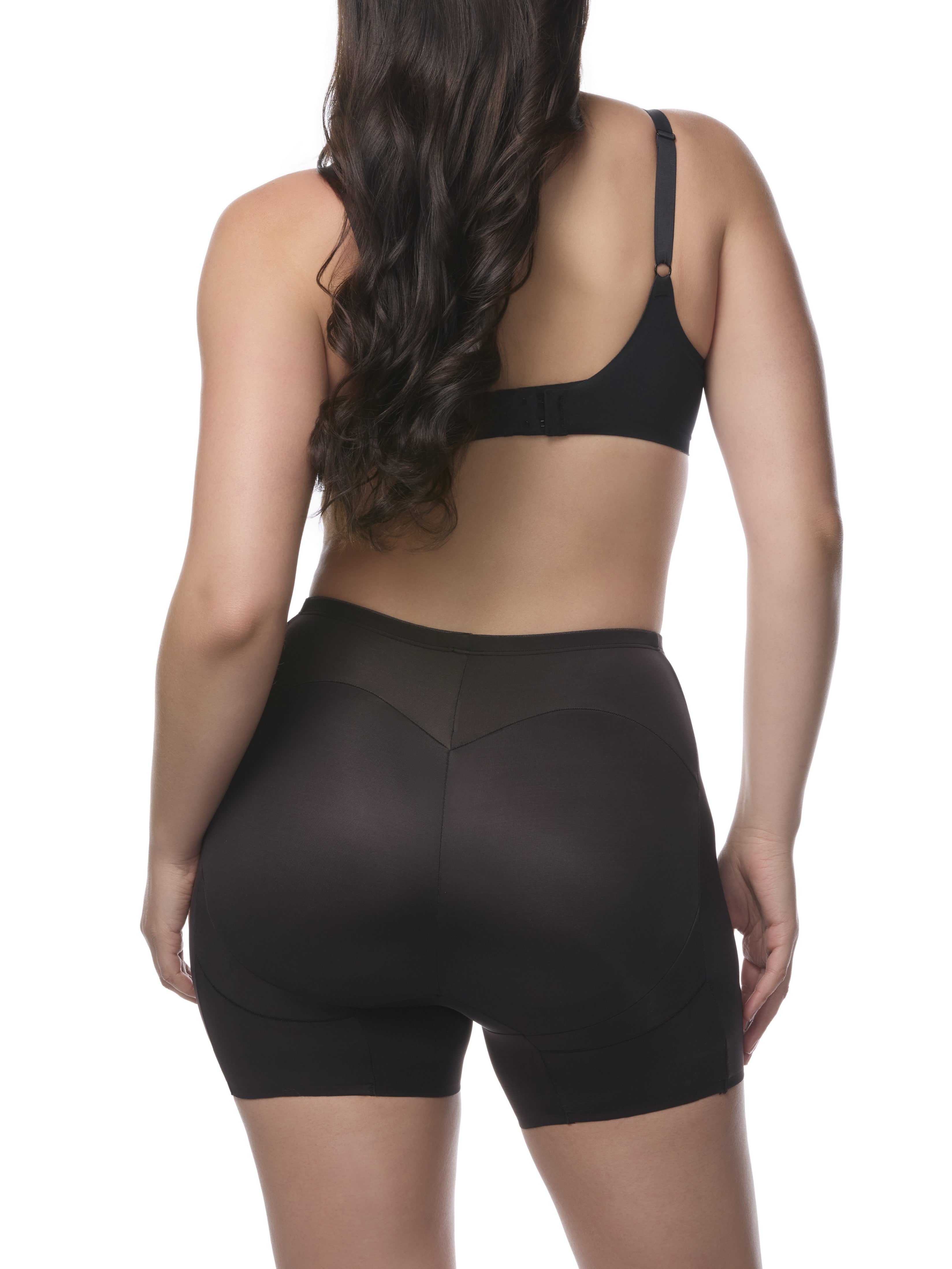 a woman wearing a black padded butt shaping short