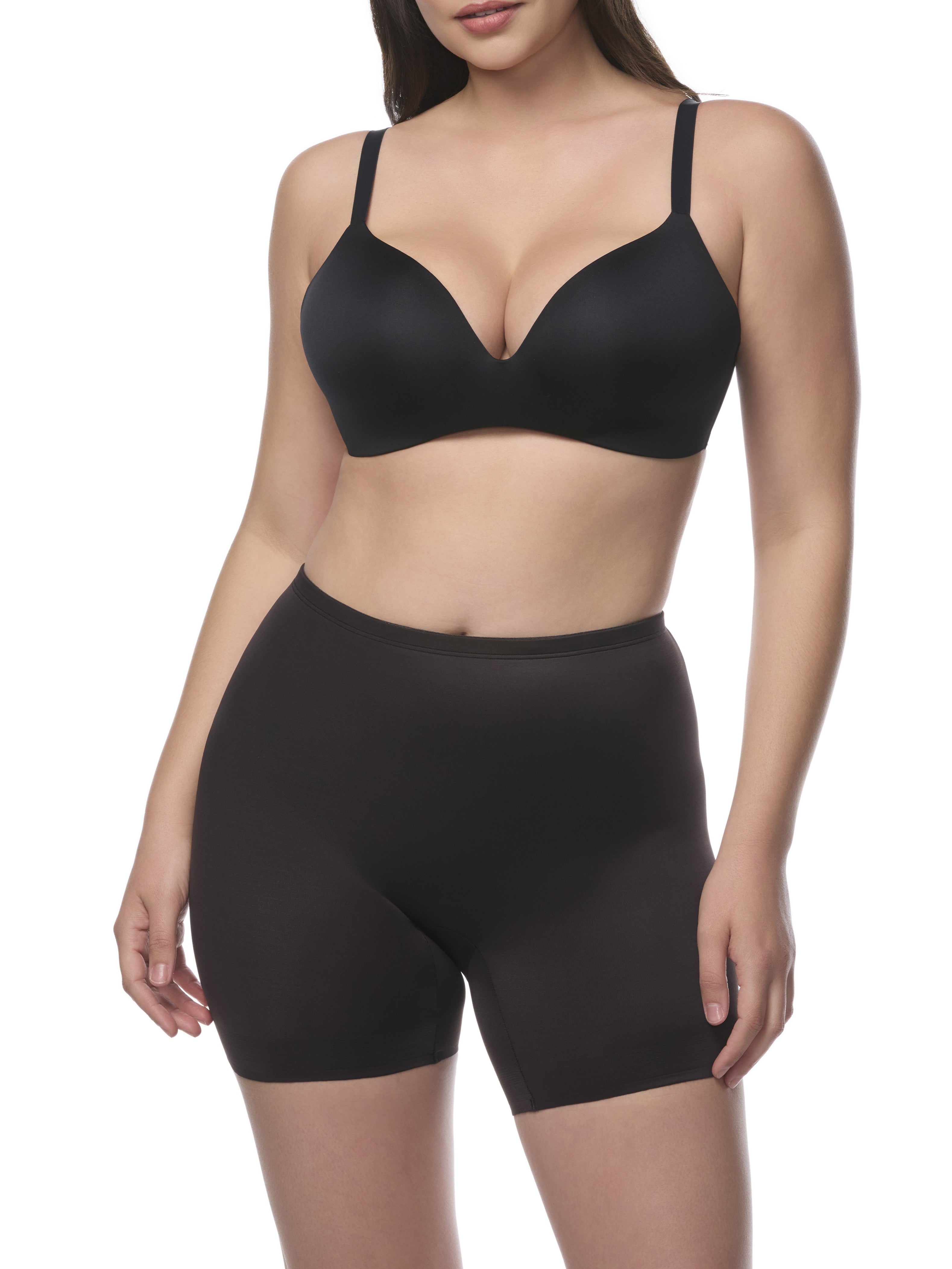 a woman wearing a black padded butt shaping short