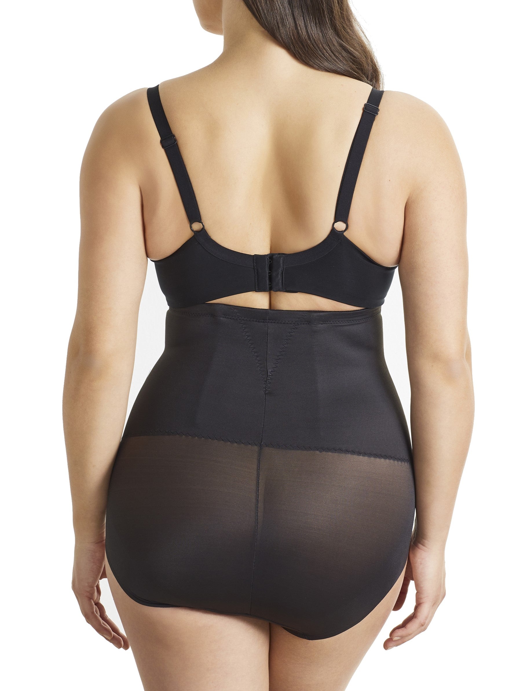 a woman wearing black high waisted tummy control underwear