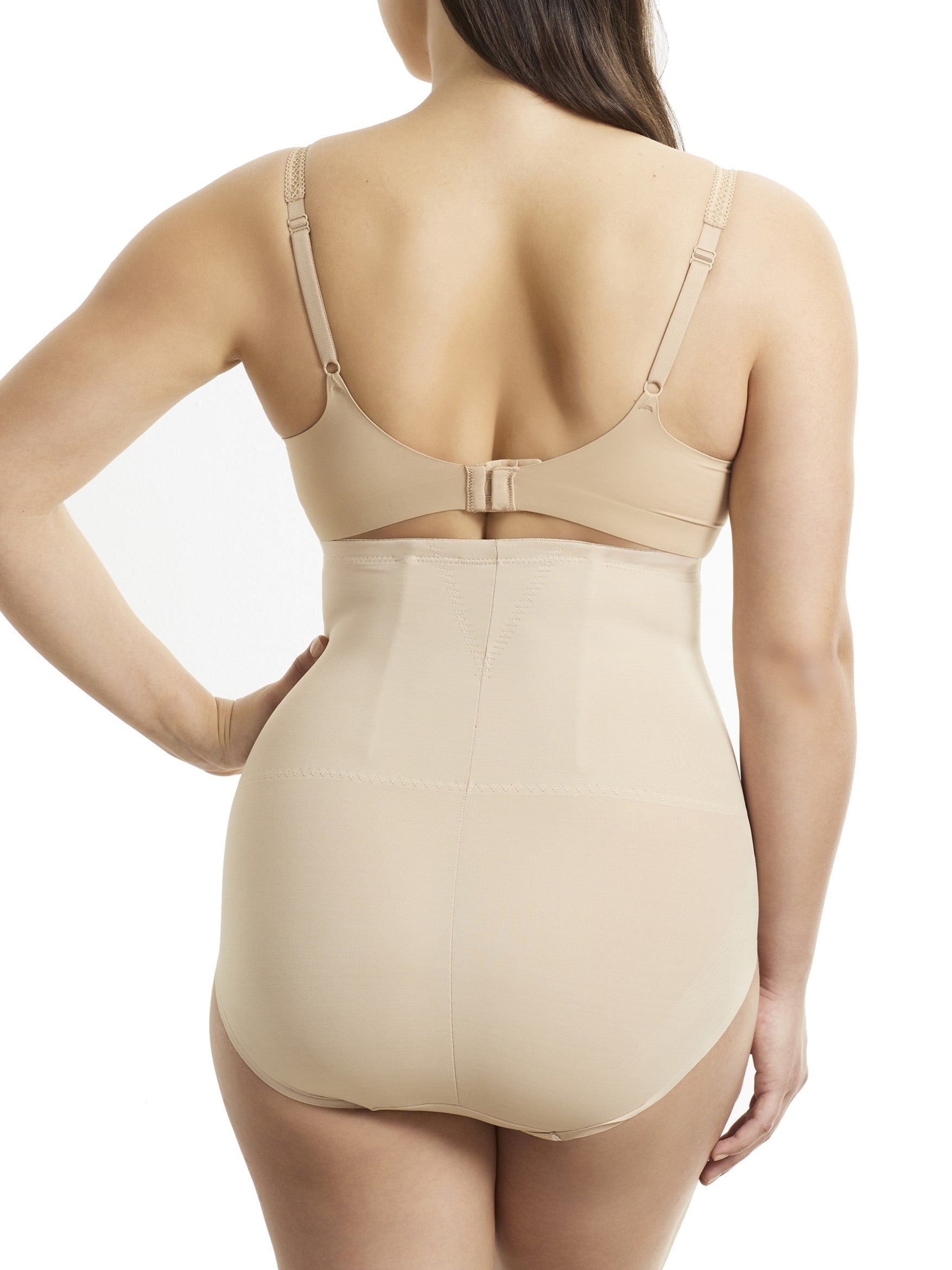 a woman wearing nude high waisted tummy control underwear