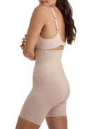 a woman wearing a nude high waisted tummy control shapewear short