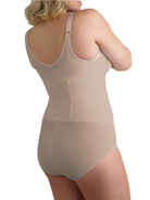 a woman wearing a nude plus size open bust tummy control body shaper shapewear