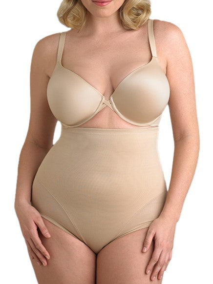 a woman wearing a beige shaping brief