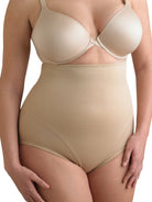 a woman wearing nude plus size high waisted tummy control underwear shapewear