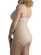 a woman wearing nude plus size high waisted tummy control underwear shapewear