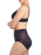 a woman wearing black tummy control underwear shapewear