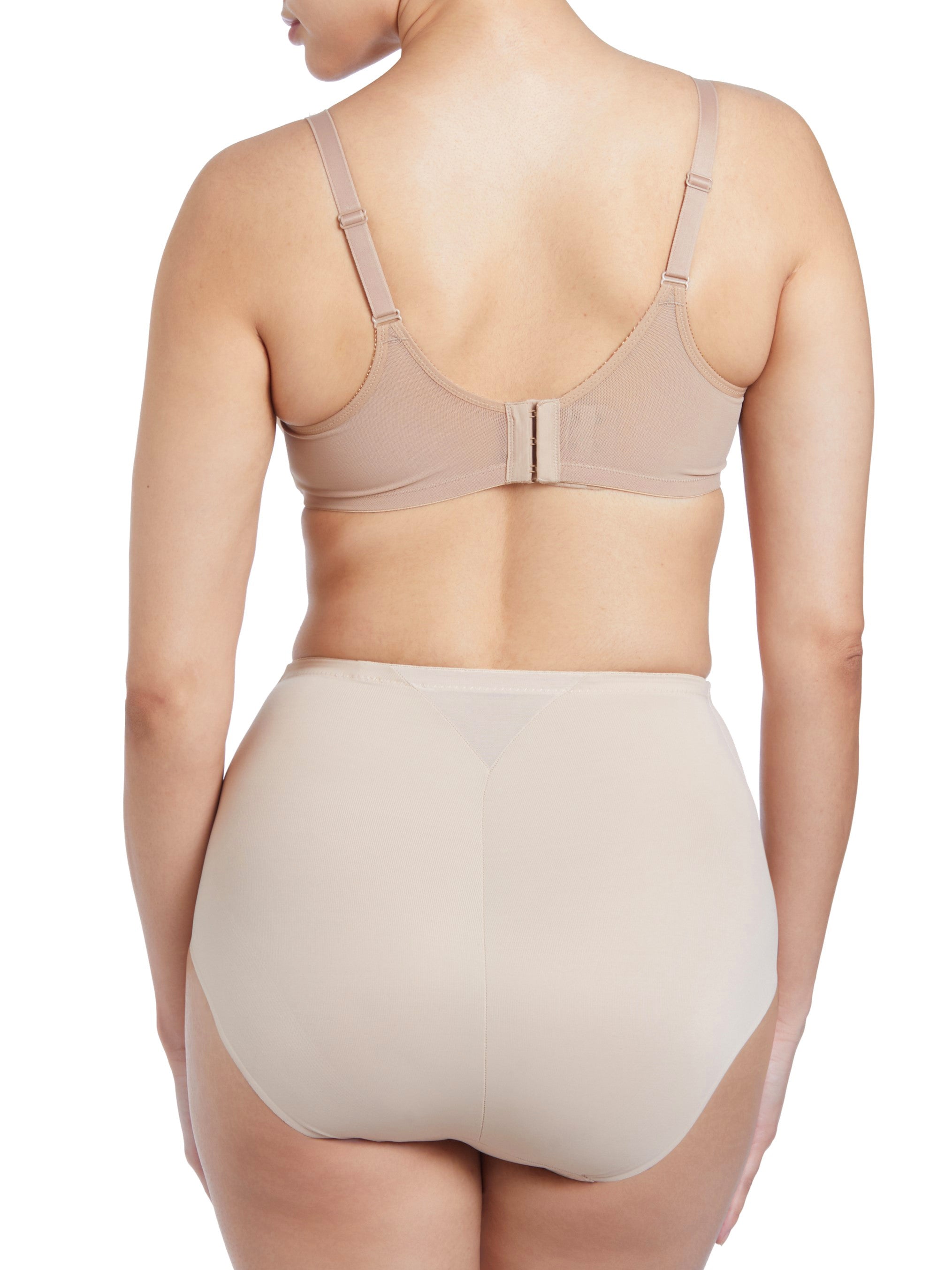 a woman wearing nude tummy control underwear shapewear