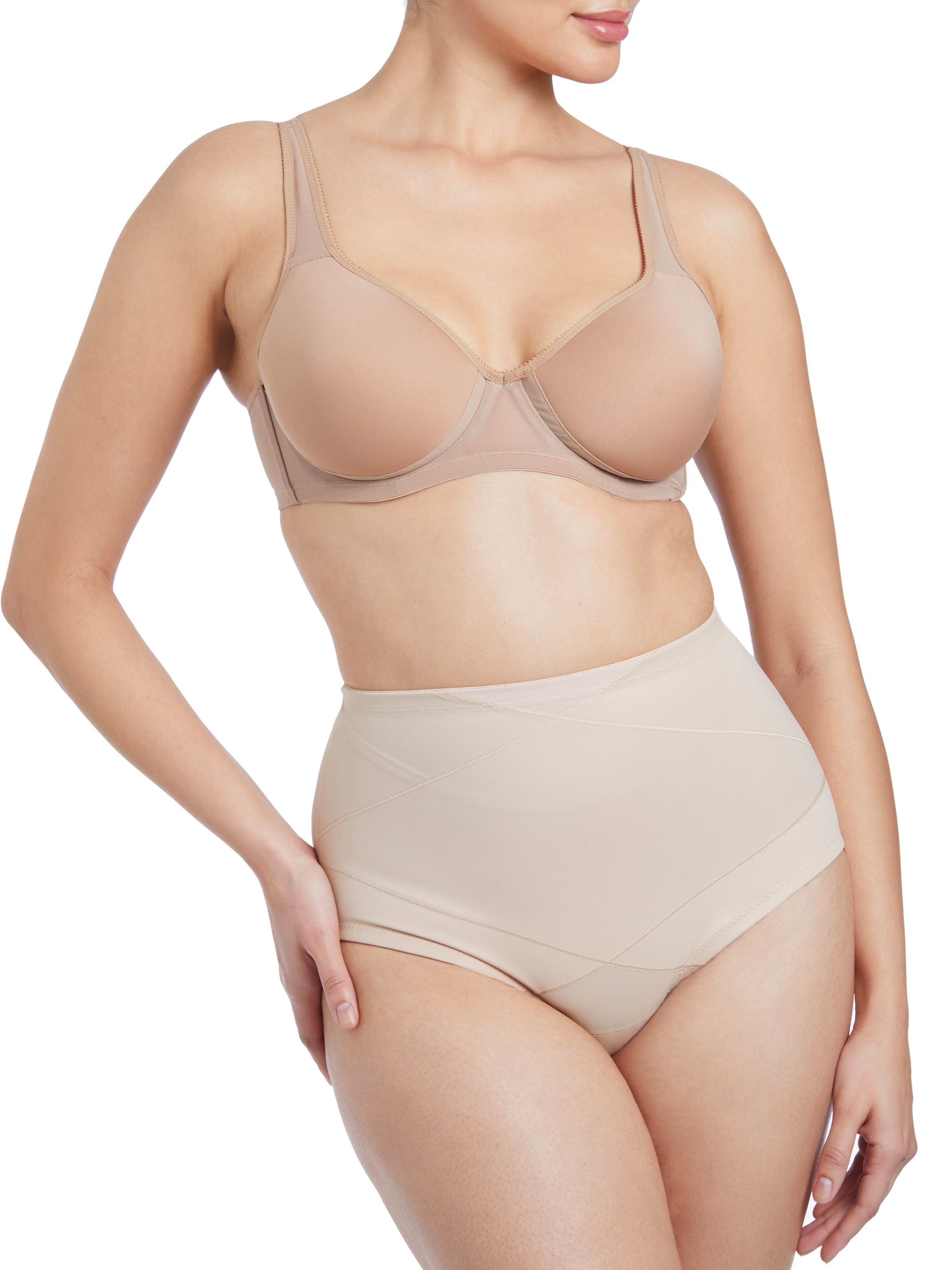 a woman wearing nude tummy control underwear shapewear