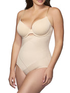 a woman wearing a nude high waisted tummy control brief