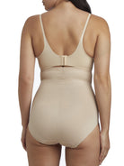 a woman wearing nude high waisted tummy control underwear