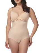 a woman wearing a beige high waisted tummy tucker cupid shapewear brief