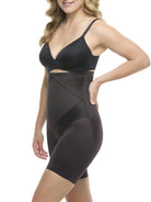 a woman wearing a black high waisted tummy control thigh slimmer body shaper shapewear