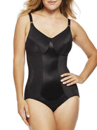 a woman wearing a black tummy control shapewear bodysuit