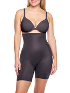 a woman wearing a black high waisted tummy control shapewear short