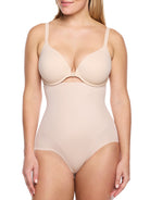 a woman wearing nude high waisted tummy control underwear shapewear