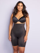 a woman wearing black high waisted tummy control shapewear shorts all-groups