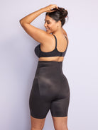 a woman wearing black high waisted tummy control shapewear shorts all-groups