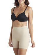 a woman wearing nude tummy control shaper shorts