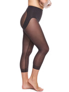 a woman wearing a black sheer shaping legging