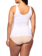 a woman wearing a white shaping camisole tank top shapewear