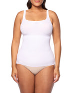 a woman wearing a white shaping camisole tank top shapewear