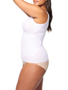 a woman wearing a white shaping camisole tank top shapewear