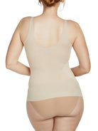 a woman wearing a nude shaping camisole tank top shapewear