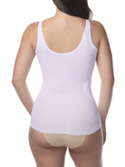 a woman wearing a white shaping camisole tank top shaper