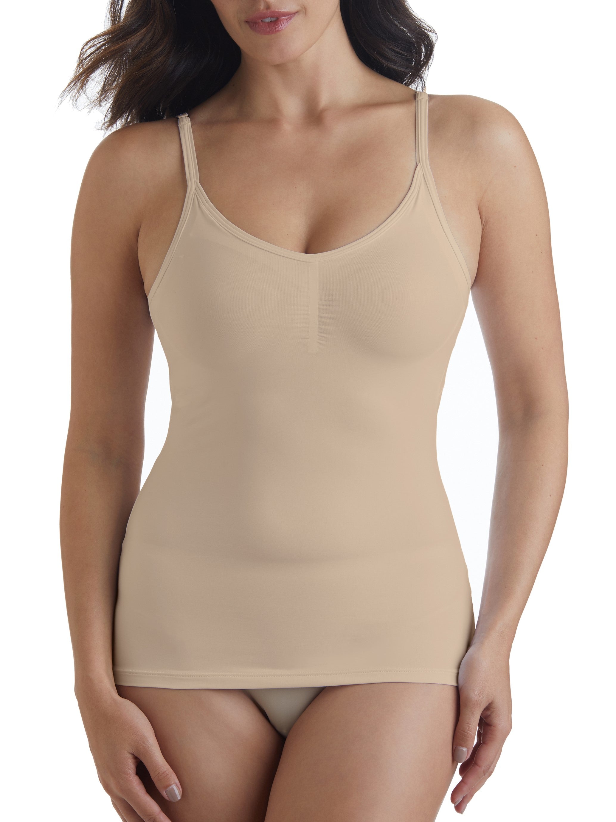 a woman wearing a beige shaping camisole