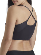 a woman wearing a black shaping wireless bra bralette