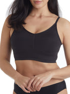 a woman wearing a black shaping wireless bra bralette